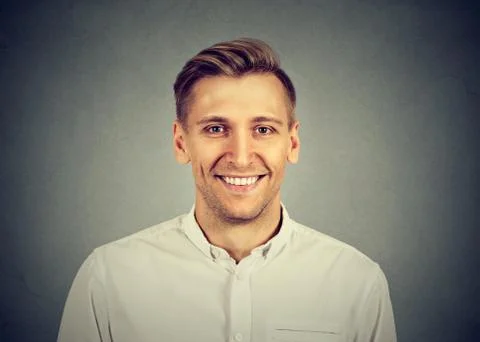 Smiling young man Stock Photos