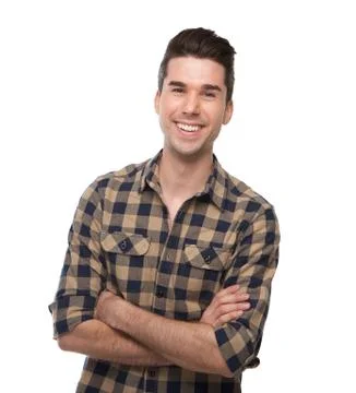 Smiling young man posing with arms crossed Stock Photos