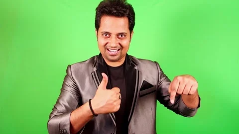 Smiling young man showing do like and subscribe comment below gesturing for.. Stock Footage 263450071