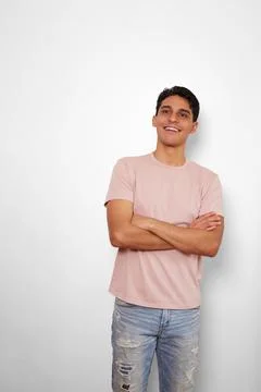 Smiling young man thinking about the future Stock Photos