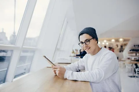 Smiling young student has time break Stock Photos