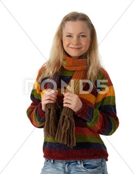 Smiling young woman wearing striped sweater Stock Photos