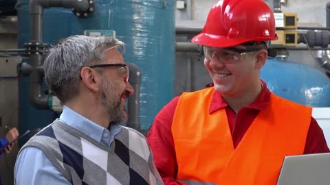 Smiling Young Worker Talking to Technical Manager With Digital Tablet Stock Footage 151823502