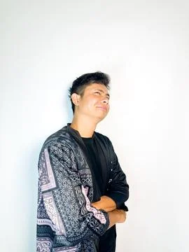 Smirking Man with a Playful Expression Stock Photos