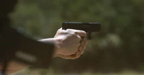 Smith and Wesson SD40VE 40 Cal Hand Gun shooting Stock Footage 76105538