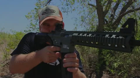 Smith and Weston M&amp;P 15-22 bumpfire more shots Stock Footage 11134305