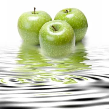 Smith apples reflected. Stock Photos