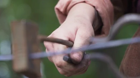 Smith forges nails Stock Footage 95766369