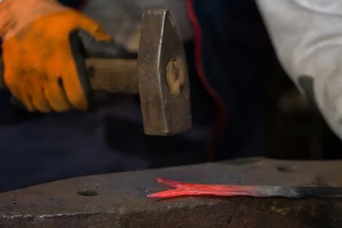 Smith forging hot iron Foto stock