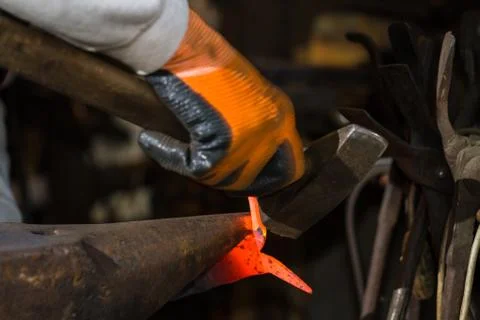 Smith forging hot iron Stock Photos
