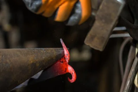Smith forging hot iron Stock Photos
