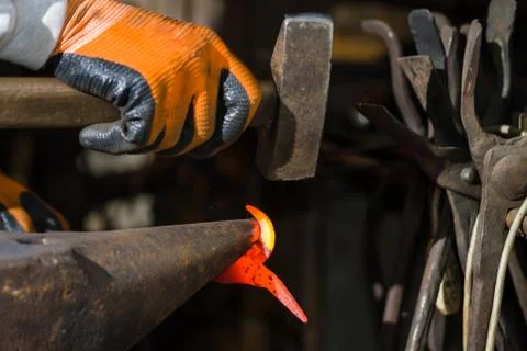 Smith forging hot iron Foto stock