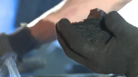 Smith hammering coal charcoal Stock Footage 49210964