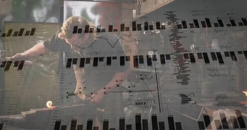 Smith hammering piece at forge, initiating chart overlays growing into angled Stock Footage 334112208