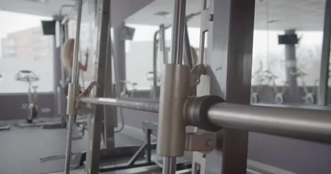 Smith machine in the gym Stock Footage 151961178