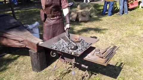 The smith makes a horseshoe 2 Stock Footage 79027997