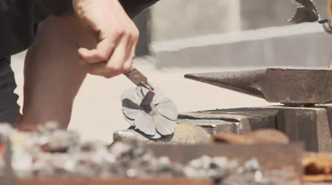 Smith makes metal rose. Slow motion. Stock Footage 54092443