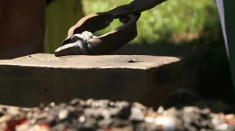 Smith Prepares a Metal Workpiece to the Work Video stock 52196927