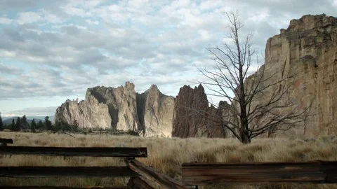 Smith Rock, Central Oregon, Timelapse with dead tree in foreground Stock Footage 83180976