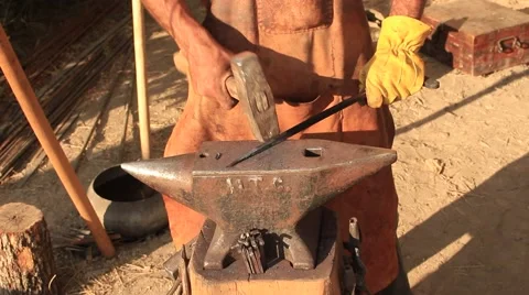 Smith is Using Hammer and Anvil Stock-Footage 65020711