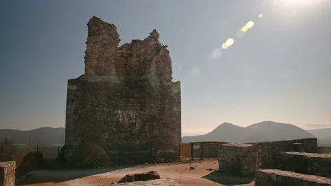 Smlednik castle defensive walls and stone tower on sunny day in Slovenia Stock Footage 149011663
