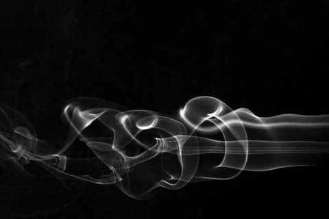 Smoke abstract in black background Stock Photos