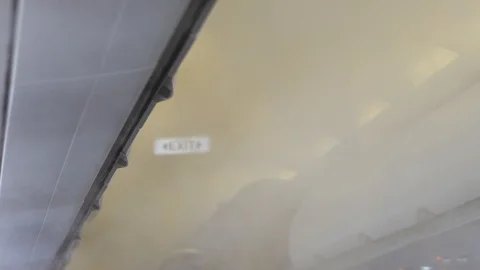 Smoke in an airplane Stock Footage 104188373