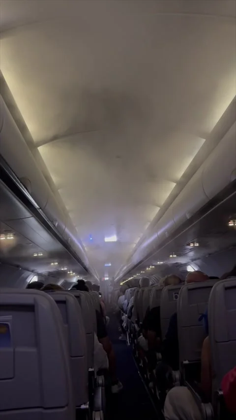 Smoke into airplane Stock Footage 290231121