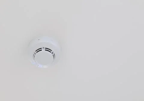 Smoke alarm on the ceiling Stock Photos