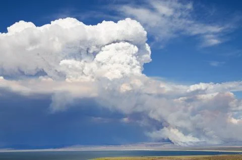 Smoke and cloud from wildfire Stock Photos