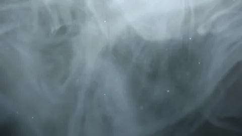 Smoke and Particles on Black Stockbeeldmateriaal 334787244