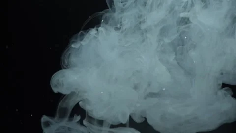 Smoke and Particles on Black Stockbeeldmateriaal 335206602