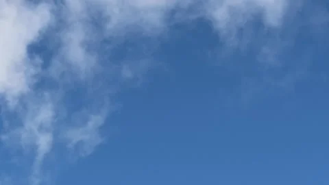 Smoke and white clouds in a sky Stock Footage 302677404