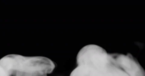 Smoke background. White smoke floating through space against black background. Stock Footage 99782448