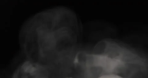 Smoke background. White smoke floating through space against black background Stock Footage 99784944