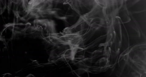Smoke background. White smoke floating through space against black background Stock Footage 114840194