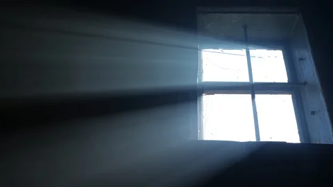Smoke in the beam. The light falls from the window. Loopable  10 Stock-Footage 128485714