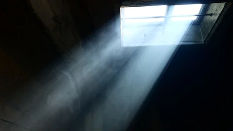Smoke in the beam. The light falls from the window. Loopable 5 Stock-Footage 128486464
