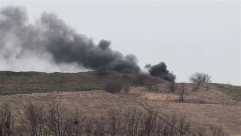 A smoke behind the hill Vídeos de archivo 75348237