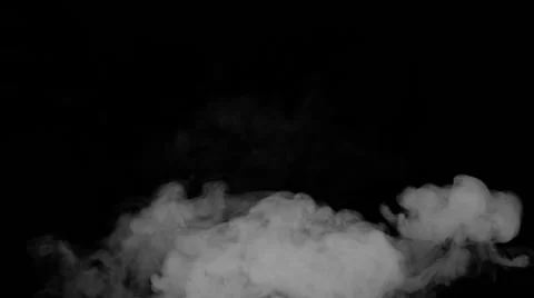 Smoke from below, slowly floating and swirling, on black background 動画素材 50954060