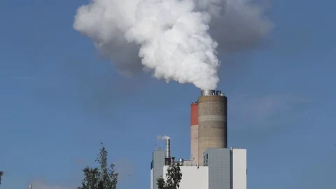 Smoke billowing from a pulp and paper factory, Finland Stock Footage 112505404