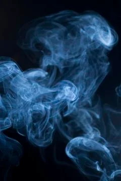 Smoke on the black background Stock Photos