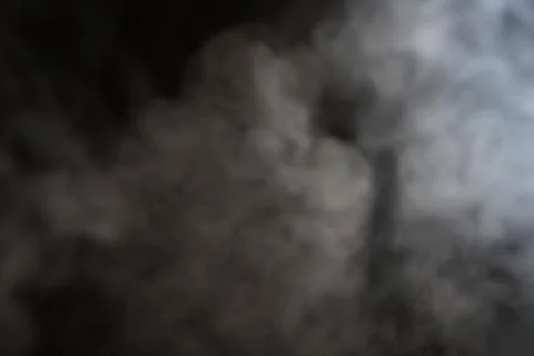 Smoke on black background Stock Photos