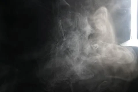 Smoke on black background Photos