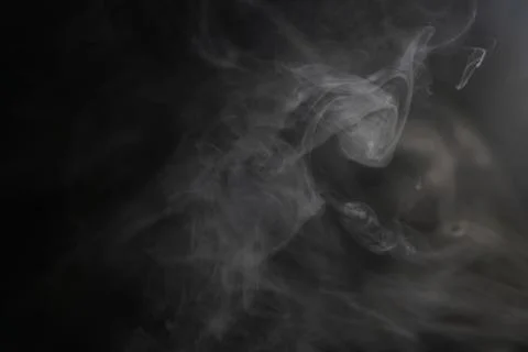Smoke on black background Stock Photos