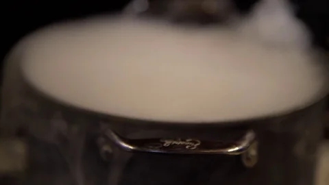 Smoke From Boiling Pot Curls Over It's Edges Stock Footage 70875892