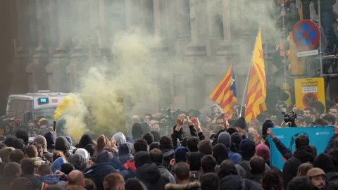 A Smoke Bomb  in a Crowded   demonstration pro Independency in Barcelona Stock Footage 106725130