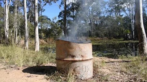 Smoke from a bonfire drum Stock Footage 76377485
