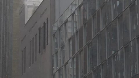 Smoke in the buildings tilt 스톡 동영상 87765176