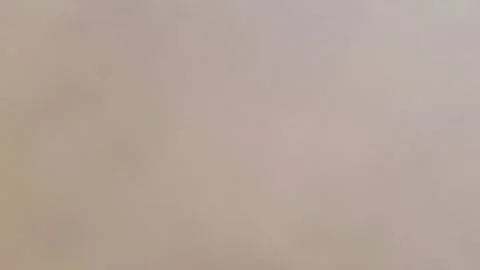 Smoke from burning garbage on a gray background Stock-Footage 334340529